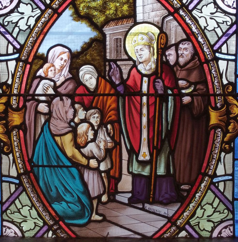 Vitrail de saint Leu par F. Haussaire, église de Courquetaine : l'évêque bénit des femmes et des enfants.
